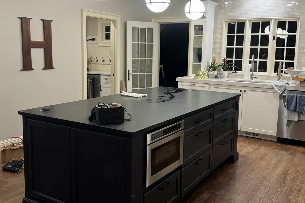 Kitchen island with pendant lights after remodel
