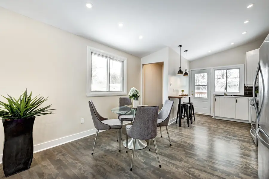 Open living area and kitchenette of a small finished suite
