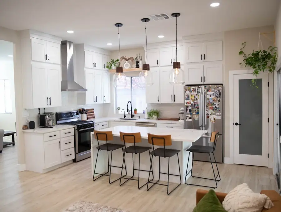 Remodeled kitchen with new cabinets and island